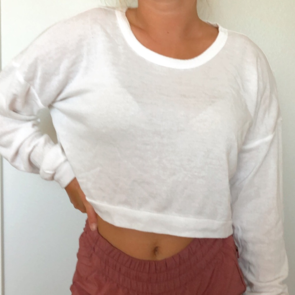 White open-back sweater